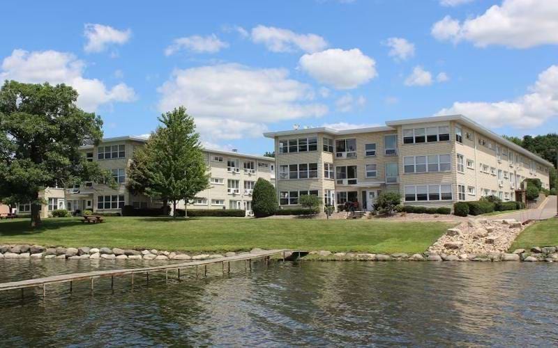 a building next to a body of water