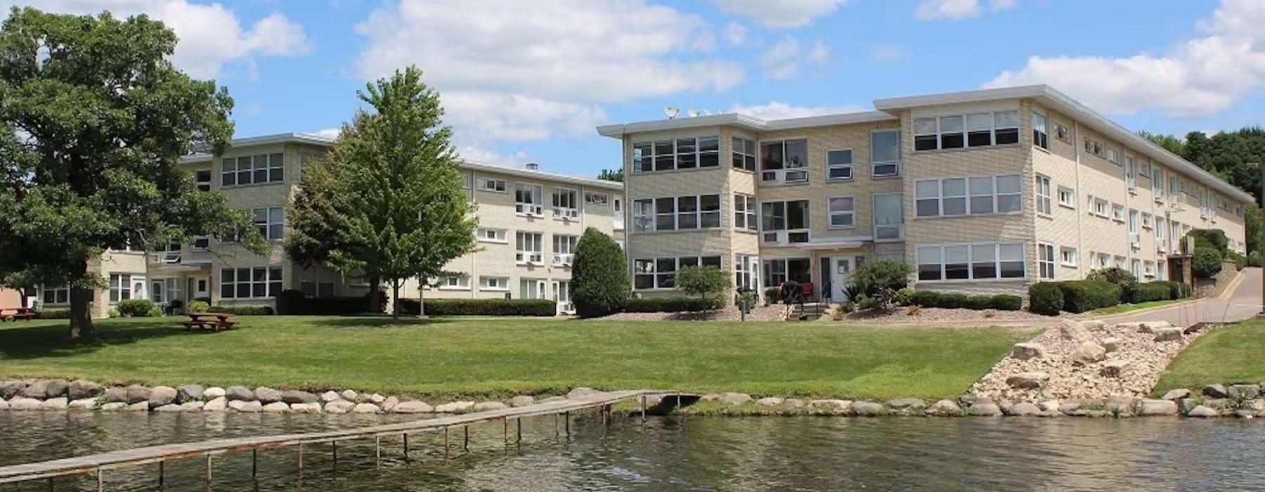 a building next to a body of water